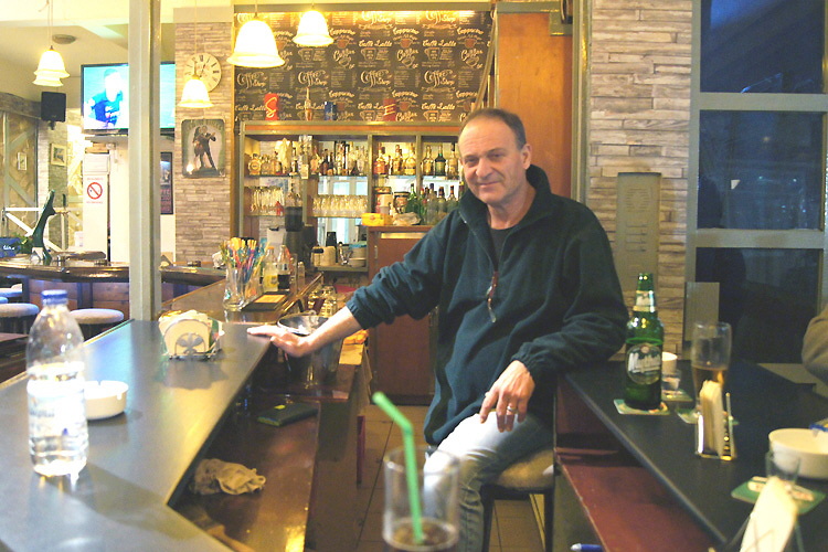 Stavros behind the bar